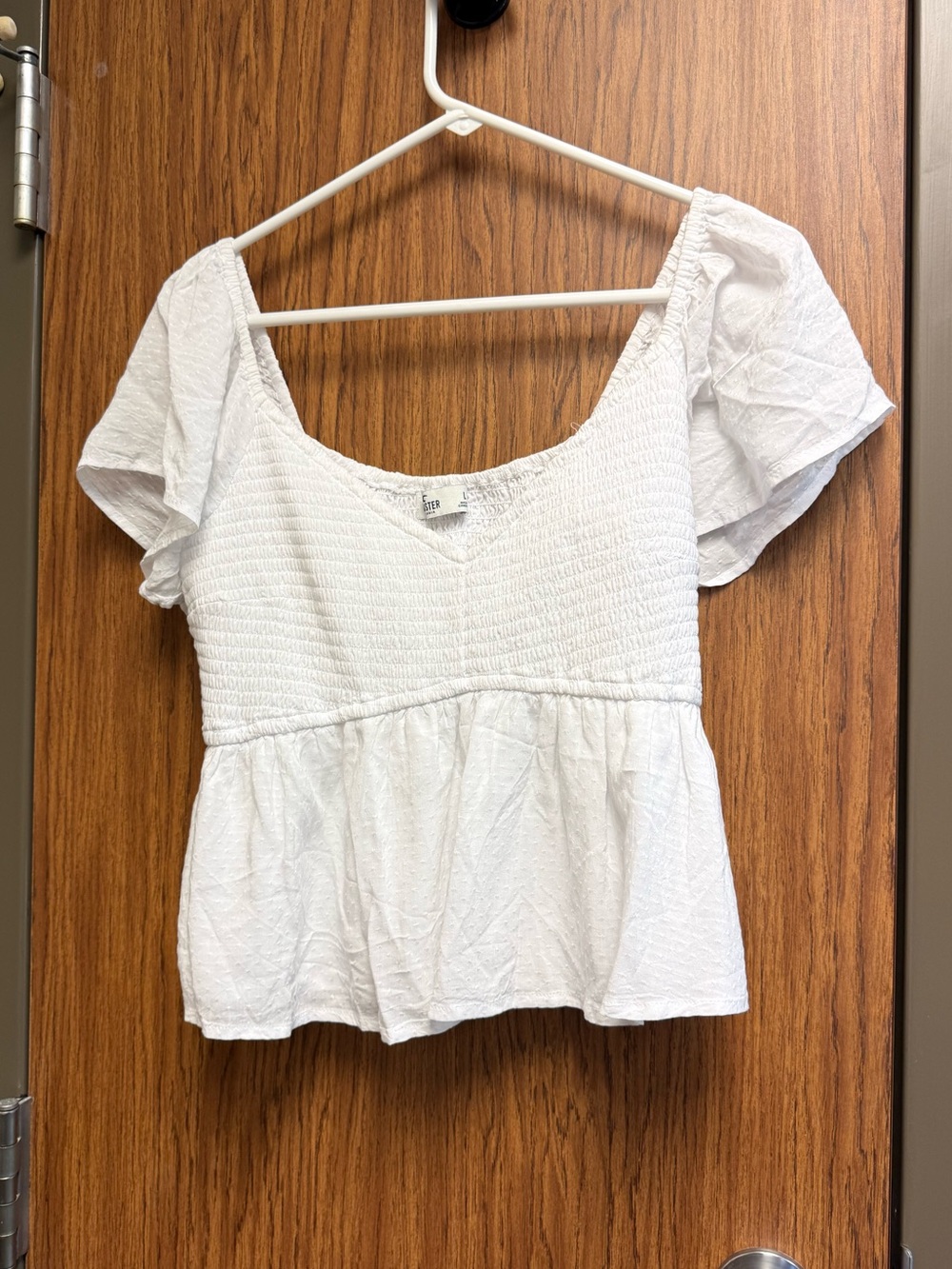 Hollister White Smocked Cropped
Peplum Top in White